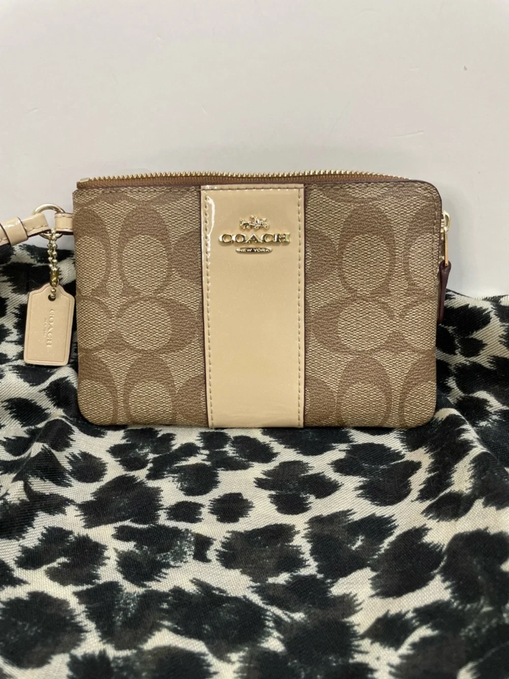 Coach Signature Zip Wristlet in Brown and Cream